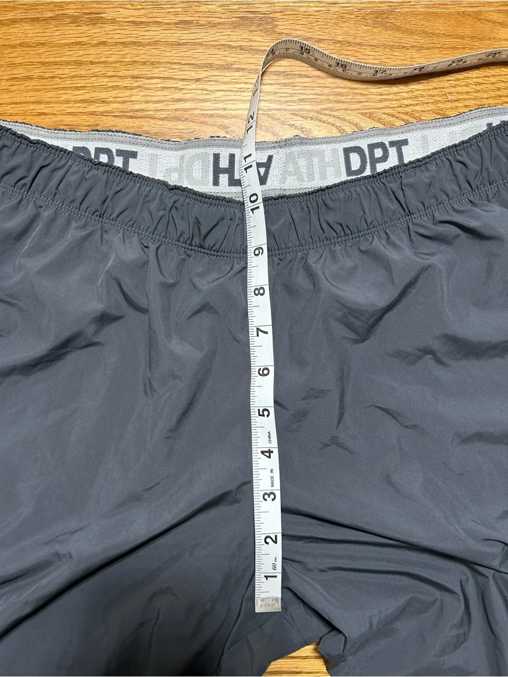 Women’s Nike the athletic dept Track Capris Grey with White Size XL